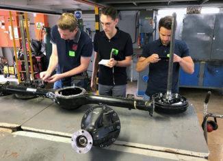 Mechatronics students working on a project